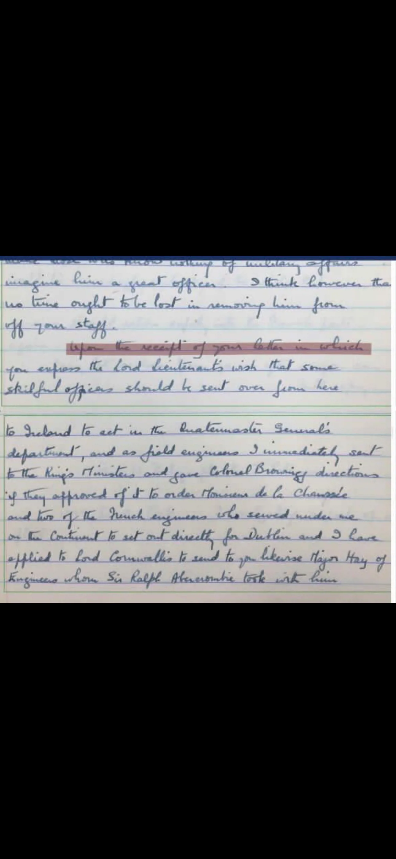 A photo of a short paragraph written by hand on paper. The writing is small and faint, and the light is dim, so it is hard to read.